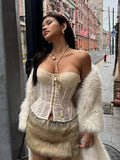 Vintage-inspired sheer lace corset top